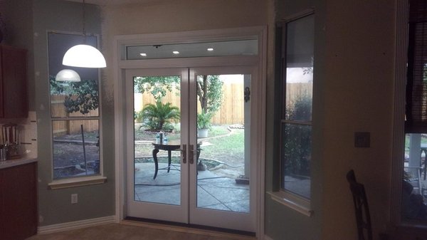 Beautiful french doors where a window used to be.