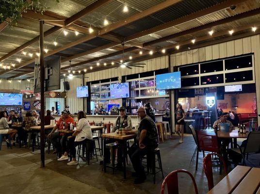 a look at the bar, the indoors section behind those garage doors