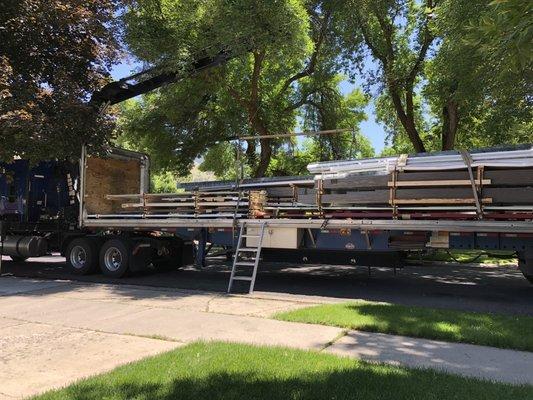 Metal being delivered right to our driveway.