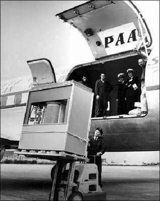 Early IBM 5 MB, 2,000 lb. Hard Drive Being Loaded on a Plane