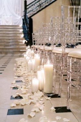 Pillar candles and flower pedals