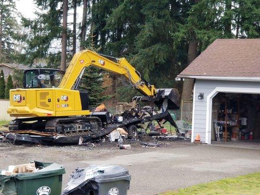 Demo of Burnt trailer next to home in spanaway wa.