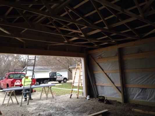 Interior portion of 24x24 post frame garage getting completed south of Fremont.