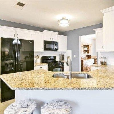 New paint, new hardware  And staging with clean uncluttered counters sold this kitchen!