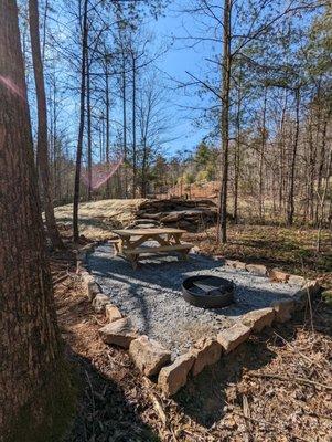 Site #190- 50' L back-in site, 50/30 amp FHU, Picnic table and fire ring w/ swivel cooking grate.