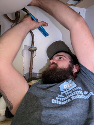 Matt fixing under sink