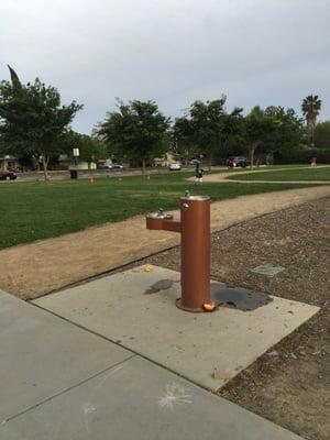 Water fountain next to the running track