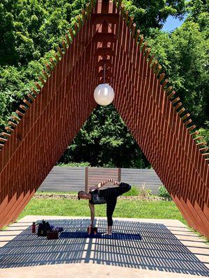 The backyard gazebo is a peaceful place for yoga and meditation.