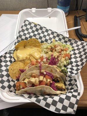 Pork tacos, salad and chips