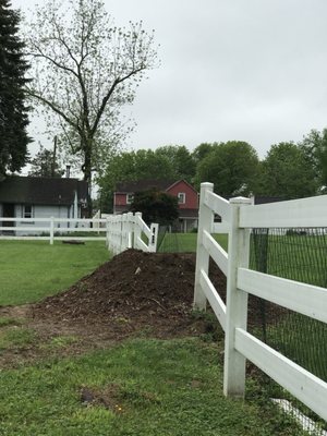 30" mulch pile left by Rick's between  2 property lines