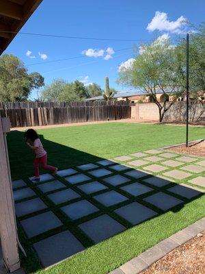 Artificial grass and paved area