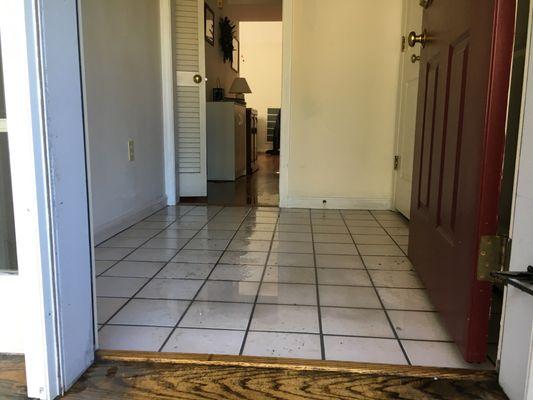 After the fire sprinklers went off water damage was left on this tile floor