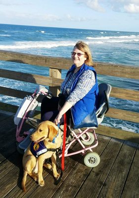 Sue G & Gunner ; her Service Dog Labrador Retriever trained by Dawn Hoppe K9