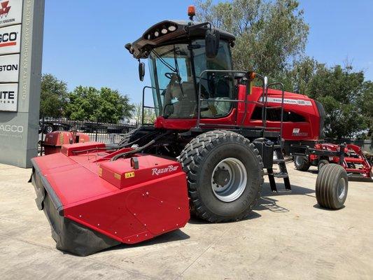 We are a full-line Massey Ferguson dealer.
 
 Photo: MF WR197 Windrower and MF 9316S 16' Disc Header