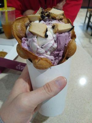 Bubble Waffle Cone with blueberry cream ice cream and cheesecake.