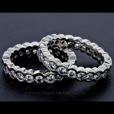 Pair of custom design platinum diamond eternity rings