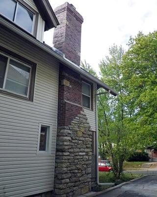 Chimney rebuilt mixture of stone and brick to replace an old stone chimney.