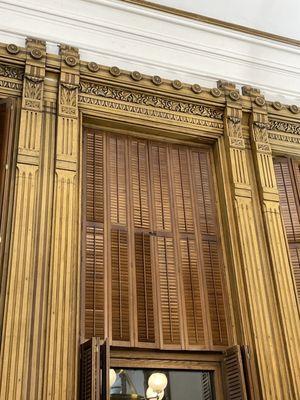 Beautiful windows with wooden shutters throughout the building