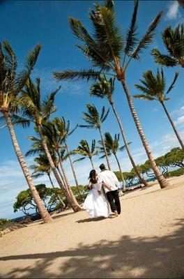 marry under palm trees, white sand, and warm breeze