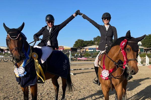 Harley Brown and Sophia Siegel celebrating a 1st, 2nd, and 3rd place finish in the Woodside Grand Prix