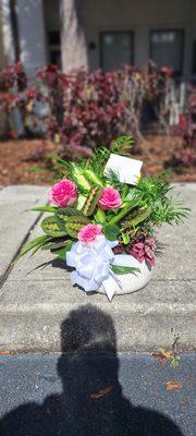 The Beautiful plant with flowers for a dear family member's funeral.