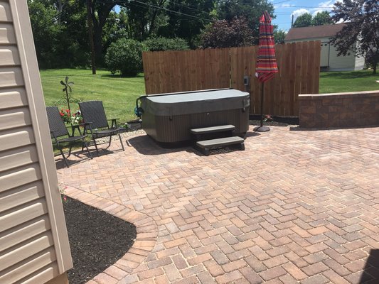 Fabulous patio installed this year, home to a nice Hot tub with a privacy screen.