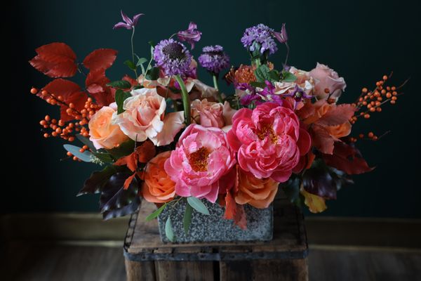 Yes, we have peonies! These full, fuchsia blooms make this Thanksgiving arrangement extra cheery.