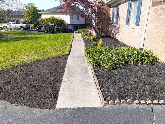 Spring clean-up, fresh application of mulch, aerated and then seeded