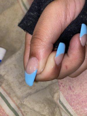 What is this? I saw what she wanted, this isn't even what she asked for. Why are her nails so bumpy?