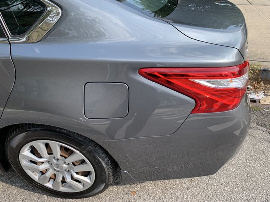 Fixed Quater Panel and Paint Touch Up on Rear Bumper.