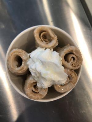 Brown sugar Thai ice cream (rolled ice cream) with whipped cream, condensed milk, and marshmallows