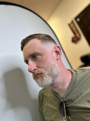 Mid fade comb over beard trim & shave.