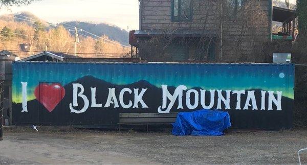 "I Love Black Mountain" container box painted by local graffiti  artist also on site where the Pizza Machine bus is located