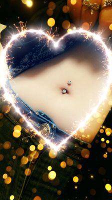 Navel (belly button) piercing. Beautifully done By Cheryl (the owner) about 4 years old.