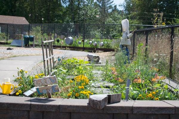 the mini learning garden, complete with scarecrow