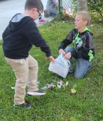 Picking up trash around Oscar Smith Middle School