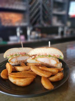 New menu item! Spicy chicken sandwich with seasoned wedge fries.