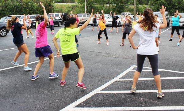 Having some fun with a Zumba class outside on a beautiful day!