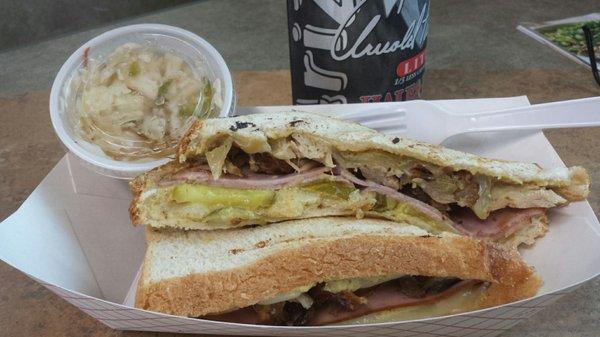 Cubano sandwich stuffings and mini-cup of sweet tasting pepper slaw.