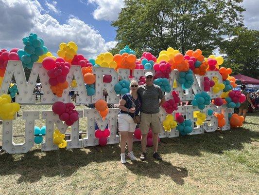 Joe and I in front of the Maryland Summerfest decorated sign