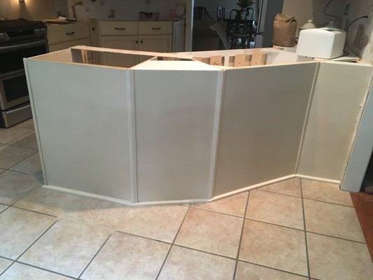 This was how they thought a $30,000 kitchen bar back should look