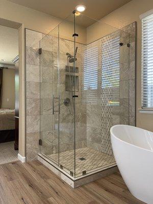 Here's another recent Frameless Shower Enclosure we installed with Clear Glass, Brushed Nickel Ladder Pull Handle and Hardware. Amazing