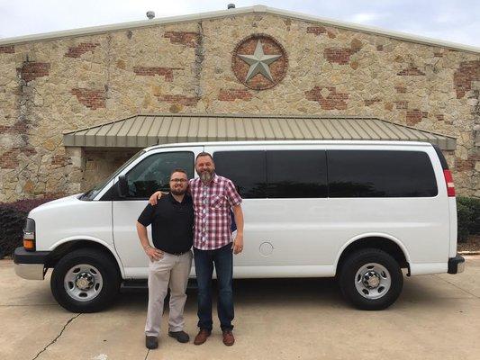 Cody Longenbaugh with owner Bobby Treece buying a beautiful van for his growing family. Great deals for great dads!