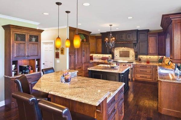 Dual-color kitchen cabinetry with custom coordinating coffee bar.