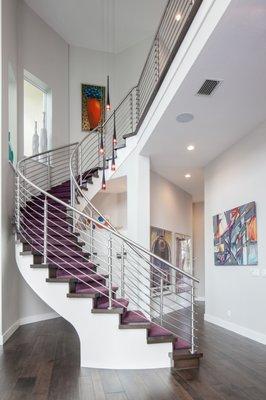 Contemporary staircase Venetian Plaster. Lighting