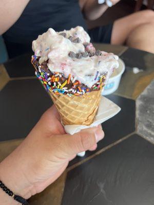 Banana ice cream with strawberries, almonds and chocolate chips