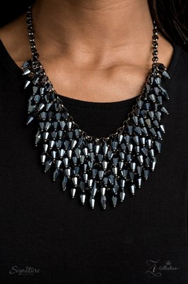 The Heather - Featuring flashy faceted edges, the mesmerizing beads spark and sizzle into a conflagration of sparkle below the collar.