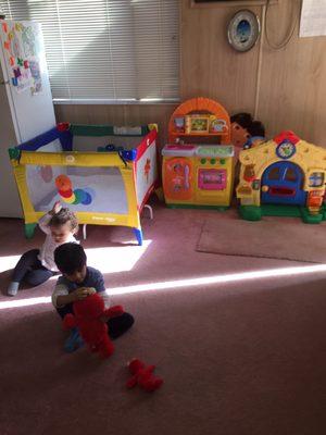 Inside our daycare in Granada Hills. Children playing inside a clean and supervised room.