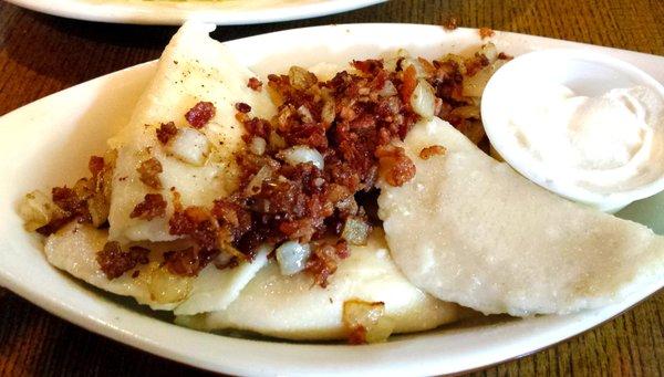 Mushroom and Kraut Pierogies with a side of sour cream. These are SO important.