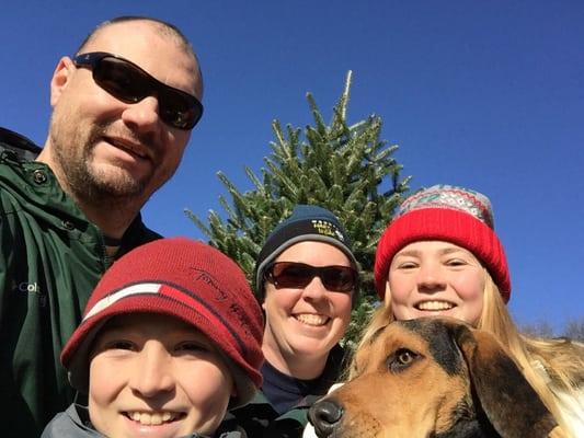 Us in front of our tree!